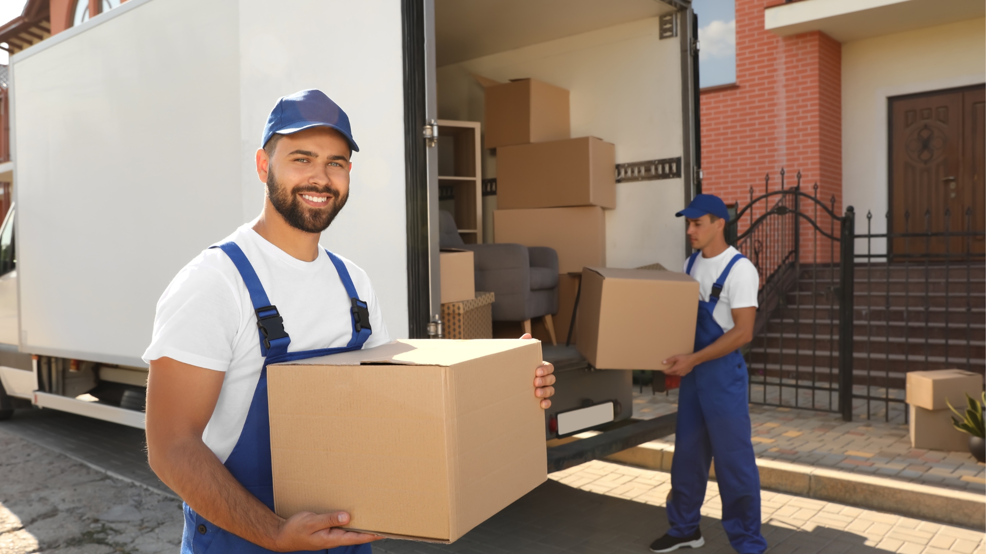 Professional movers handling boxes — White Glove moving service